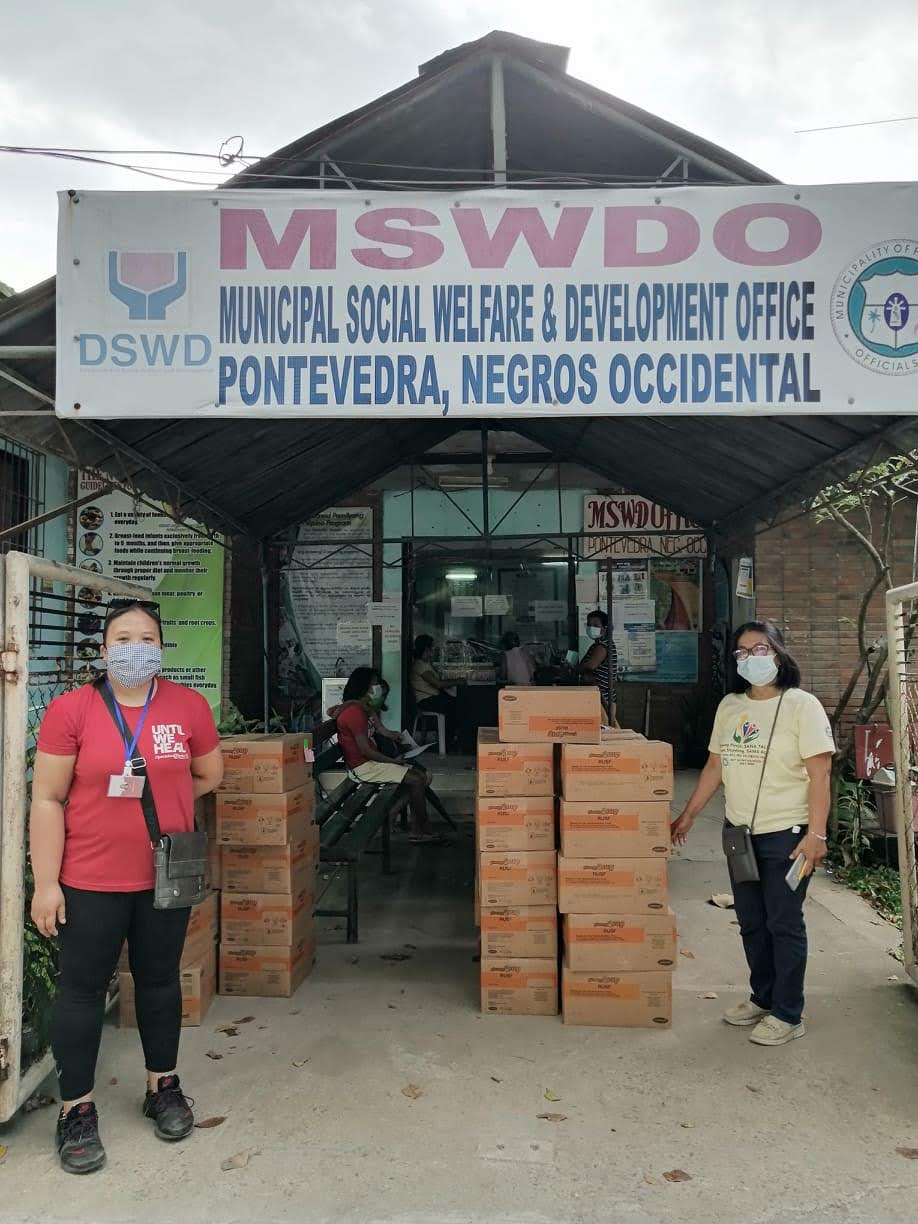 ICM staff distribute therapeutic food in Negros