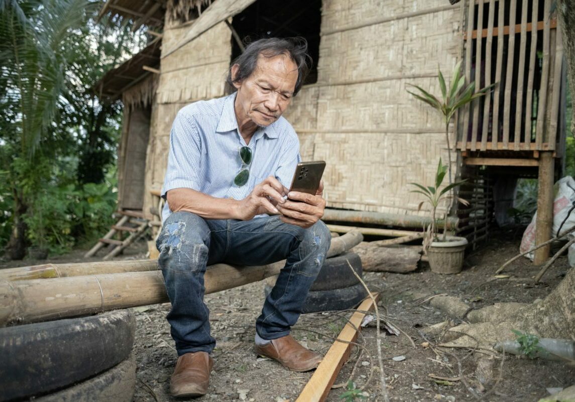 A-Pastor-using-REDI-on-his-phone-copy-scaled-1