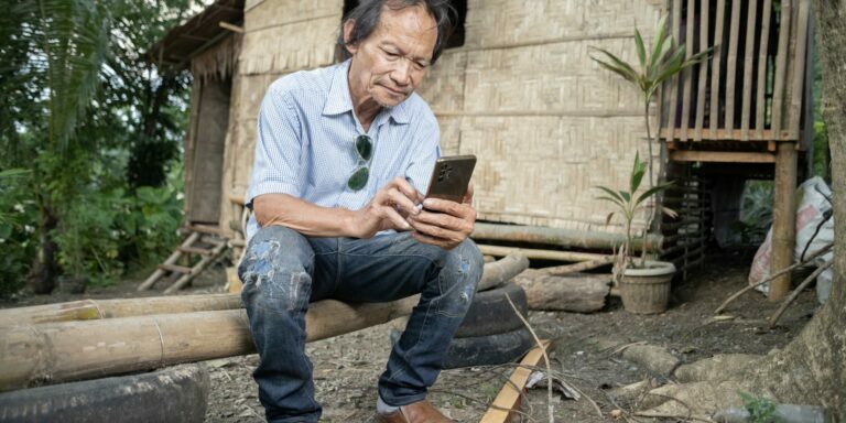 A-Pastor-using-REDI-on-his-phone-copy-scaled-1