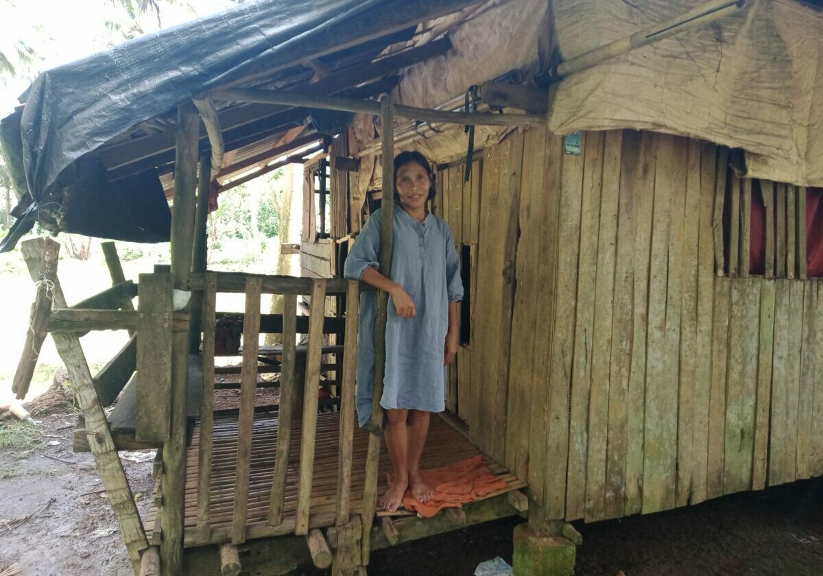 DIP_Merlie-in-front-of-her-house-scaled-1