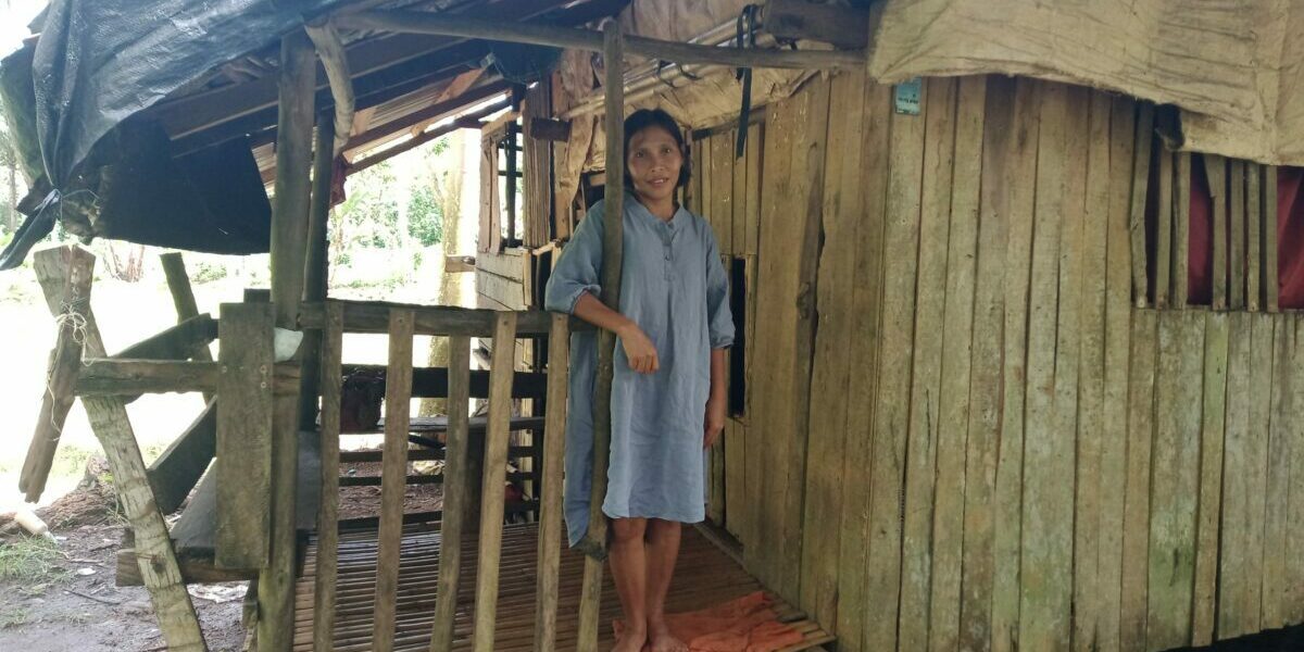 DIP_Merlie-in-front-of-her-house-scaled-1