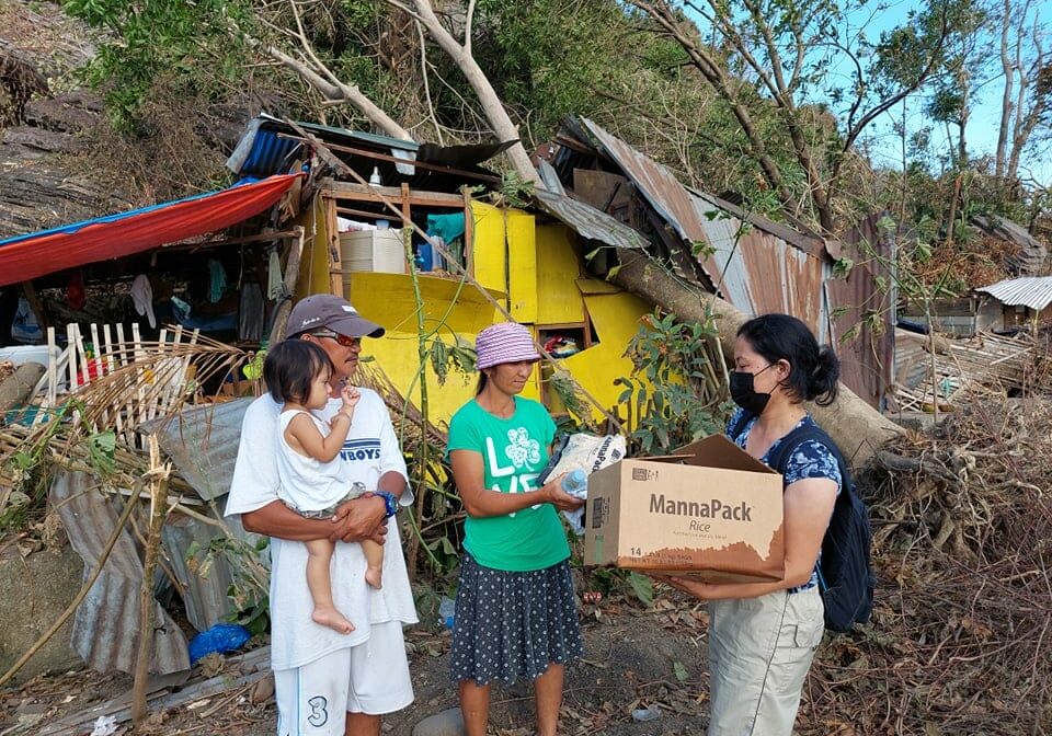 Family-with-damaged-house-recieved-a-box-of-food-pack_Bais-City-2