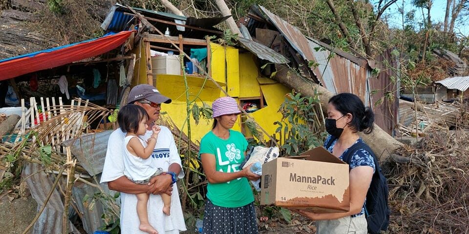 Family-with-damaged-house-recieved-a-box-of-food-pack_Bais-City-2