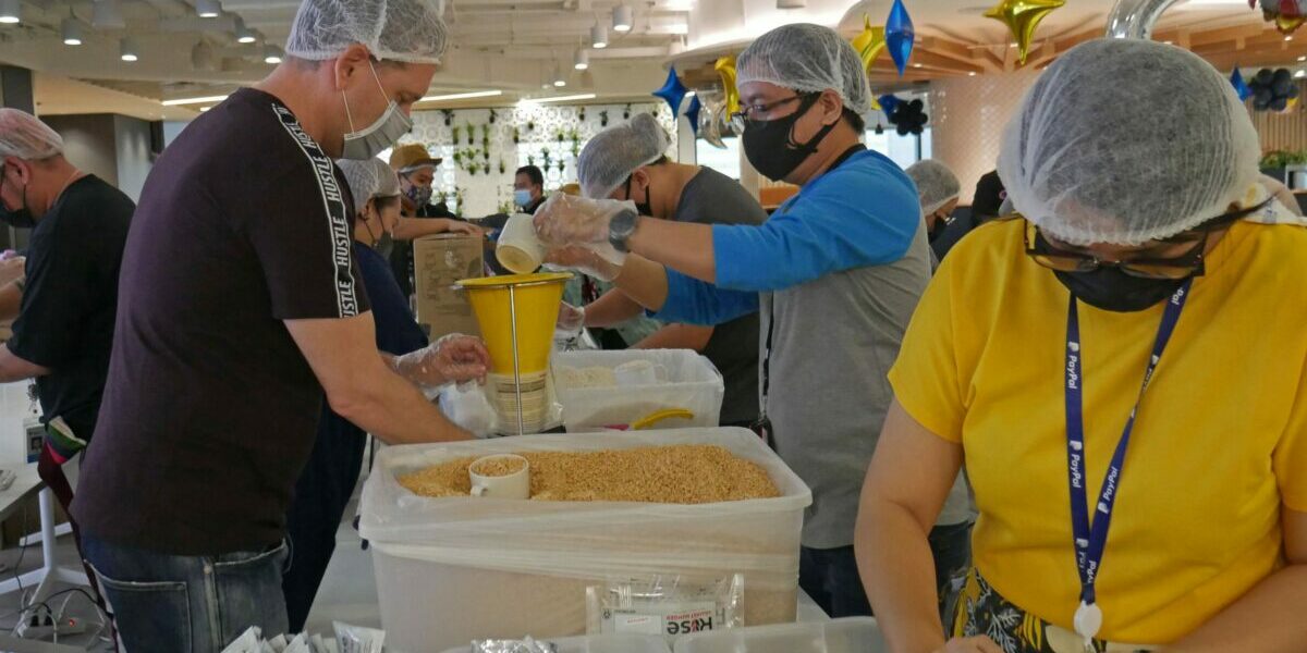 John-Nicholls-packing-meals-scaled-1