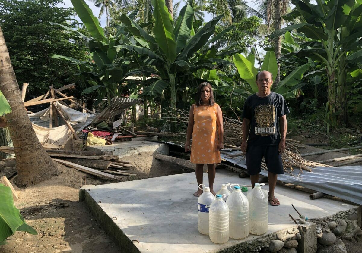 Marivic-and-her-husband_This-is-where-there-house-used-to-stand-1-scaled-1