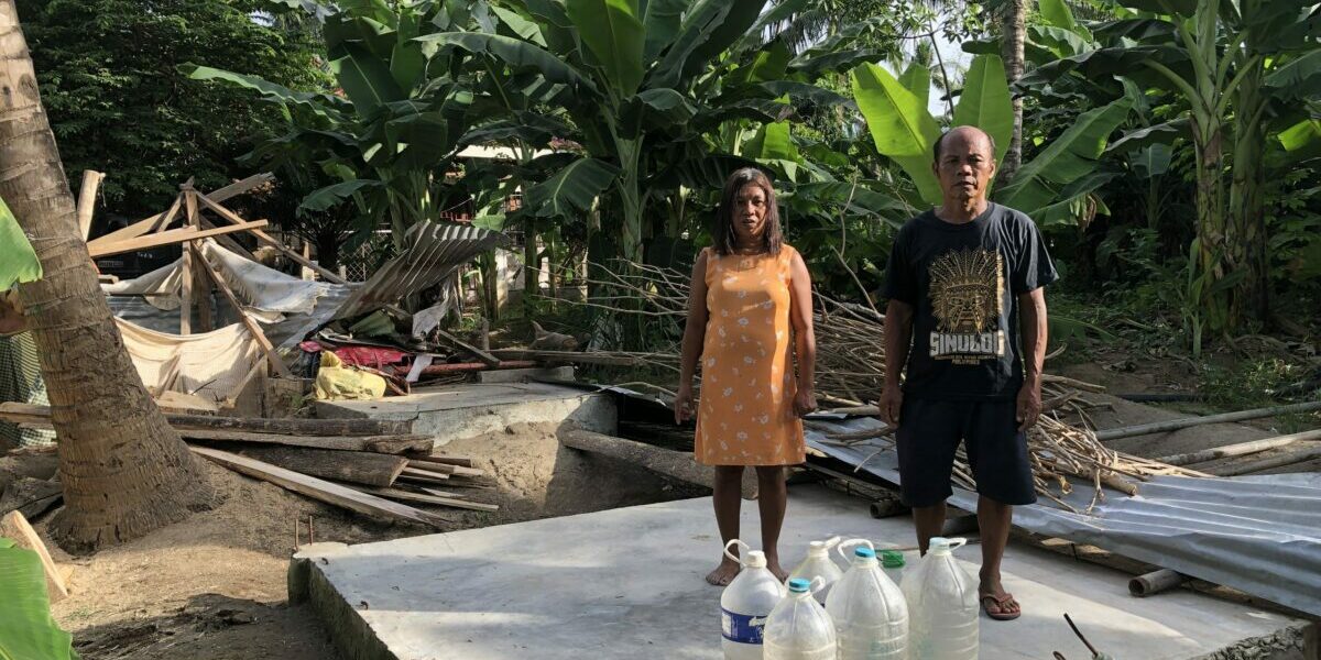 Marivic-and-her-husband_This-is-where-there-house-used-to-stand-1-scaled-1