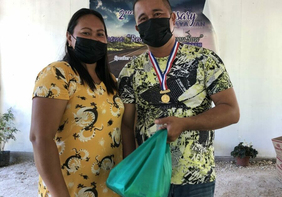 Regie-awarded-Top-1-during-the-Transform-Graduation_with-his-Wife-1-scaled-1